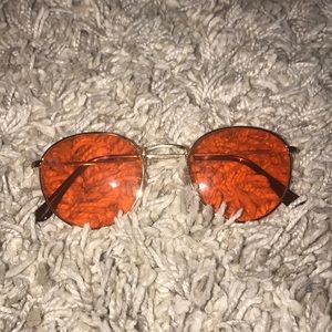 Round orange glasses